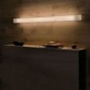 Lámpara aplique pared I-Club Slim de Luzifer. Lámpara simétrica de diseño de Burkhard Dämmer.