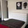 Cama Squaring alto de Bonaldo. Mobiliario de diseño. Diseño moderno.