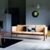 Sofá CH163 piel de Carl Hansen and Son con un diseño único que entrega calidez y modernidad.