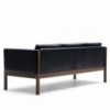 Sofá CH163 piel de Carl Hansen and Son con un diseño único que entrega calidez y modernidad.