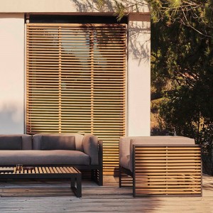 Sillón de diseño original DNA Teca para jardín de Gandia Blasco.