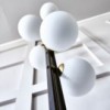 Lámpara de pie Planeta de Cattelan Italia. Iluminación de diseño moderno.