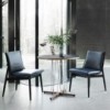 Mesa Embrace E020 de Carl Hansen and Son. Mesas de diseño moderno y elegante.
