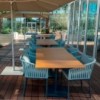Silla comedor exterior con pies de aluminio brazos Bela Rope colección Bitta de Kettal.