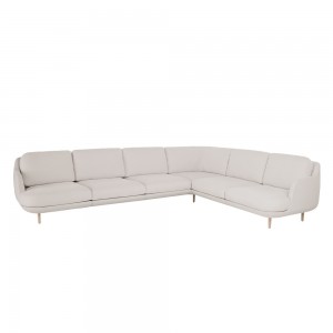 Sofá Lune esquinero de Fritz Hansen con un diseño moderno de alto lujo.