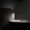 Lámpara de sobremesa con base redonda Flo Desk de Foster+Partners y Lumina
