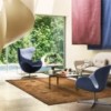 Sillón Egg tapizada Frizt Hanse con un diseño danes moderno y elegante.