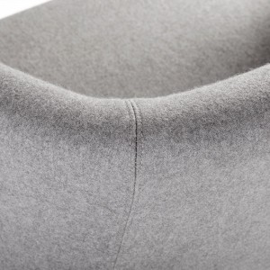 Butaca Lotus de Bensen con una base giratoria y un diseño moderno, lleno de elegancia.