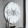 Espejo Times de Cattelan Italia. Espejo con reloj. Espejos de pared modernos.