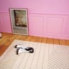 Alfombra de puntos de Fritz Hansen con diseños estilizados y acabados modernos.
