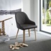 Sillón Atena de Ozzio design. Estructura en madera y tapizado en piel, ecopiel o terciopelo.