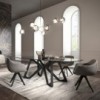 Sillón Delia de Ozzio design. Estructura en madera y tapizado en piel, ecopiel o terciopelo.