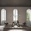 Sillón Delia de Ozzio design. Estructura en madera y tapizado en piel, ecopiel o terciopelo.
