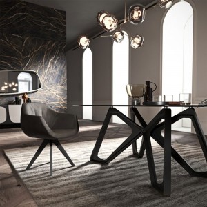 Sillón Delia de Ozzio design. Estructura en madera y tapizado en piel, ecopiel o terciopelo.