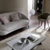 Sillón Eliot de Ozzio design. Estructura en madera y tapizado en piel, ecopiel o terciopelo.