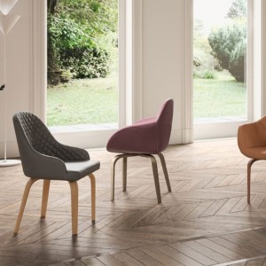 Sillón Gavia de Ozzio design. Estructura en madera y tapizado en piel, ecopiel o terciopelo.
