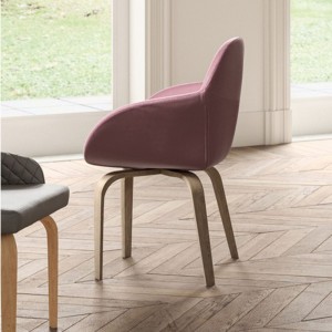 Sillón Gavia de Ozzio design. Estructura en madera y tapizado en piel, ecopiel o terciopelo.