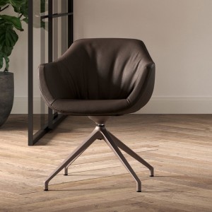 Sillón Halia de Ozzio design. Estructura en metal tapizado en piel, ecopiel o terciopelo.