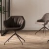 Sillón Halia de Ozzio design. Estructura en metal tapizado en piel, ecopiel o terciopelo.