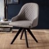 Sillón Olimpia de Ozzio design. Estructura en madera y tapizado en piel, ecopiel o terciopelo.
