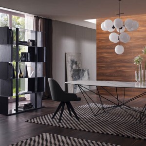 Sillón Olimpia de Ozzio design. Estructura en madera y tapizado en piel, ecopiel o terciopelo.