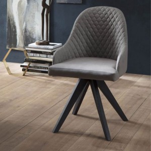 Sillón Olimpia de Ozzio design. Estructura en madera y tapizado en piel, ecopiel o terciopelo.