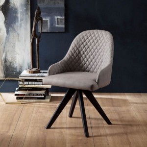 Sillón Olimpia de Ozzio design. Estructura en madera y tapizado en piel, ecopiel o terciopelo.