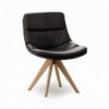 Sillón Sally de Ozzio design. Estructura en madera y tapizado en piel o terciopelo.