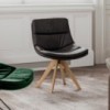 Sillón Sally de Ozzio design. Estructura en madera y tapizado en piel o terciopelo.