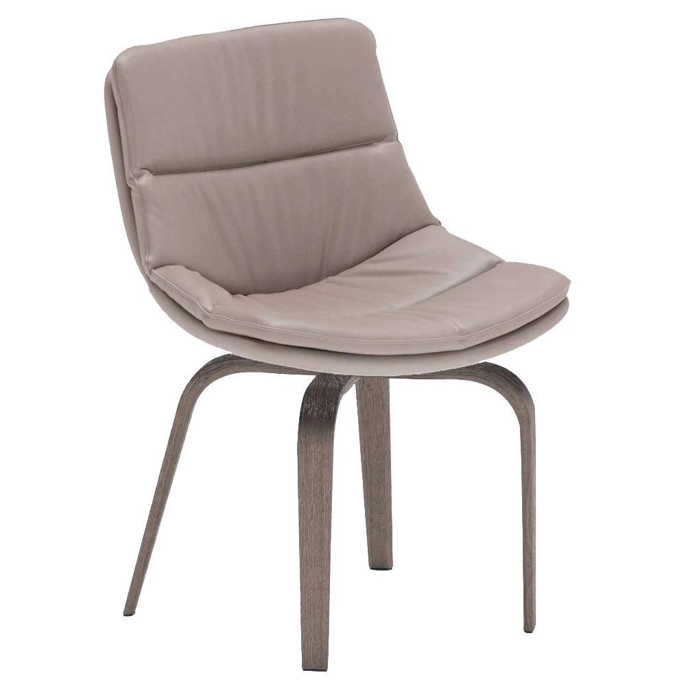 Sillón Selena de Ozzio design. Estructura en madera y tapizado en piel o terciopelo.