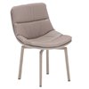 Sillón Siria de Ozzio design. Estructura giratoria tapizada en piel o terciopelo.