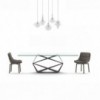 Sillón Siria de Ozzio design. Estructura giratoria tapizada en piel o terciopelo.