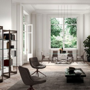 Sillón Sveva de Ozzio design. Estructura en metal y tapizado en piel o terciopelo.