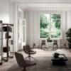Sillón Sveva de Ozzio design. Estructura en metal y tapizado en piel o terciopelo.