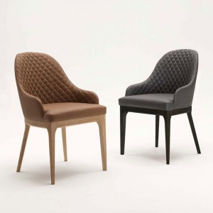 Sillón Thelma de Ozzio design. Estructura en madera y tapizado en piel, ecopiel o terciopelo.