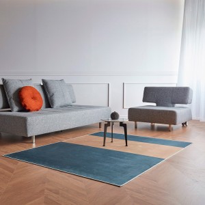 Sillón cama de diseño Long Horn Excess Lounger para salón de Innovaction Living.