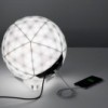 Lámpara sobremesa Huara Artemide con diseño tipo esfera, moderno y elegante.