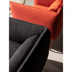 Butaca cómoda Groove para salón de Softline. Muebles de diseño nórdico.