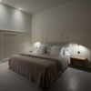 Lámpara aplique Pin de Vibia. Lámparas modernas ideales para salones. 