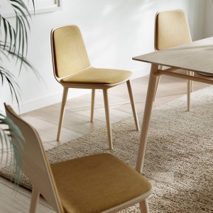 Silla Bisell madera con almohadilla de Treku. Descubre la nueva silla Bell de Treku