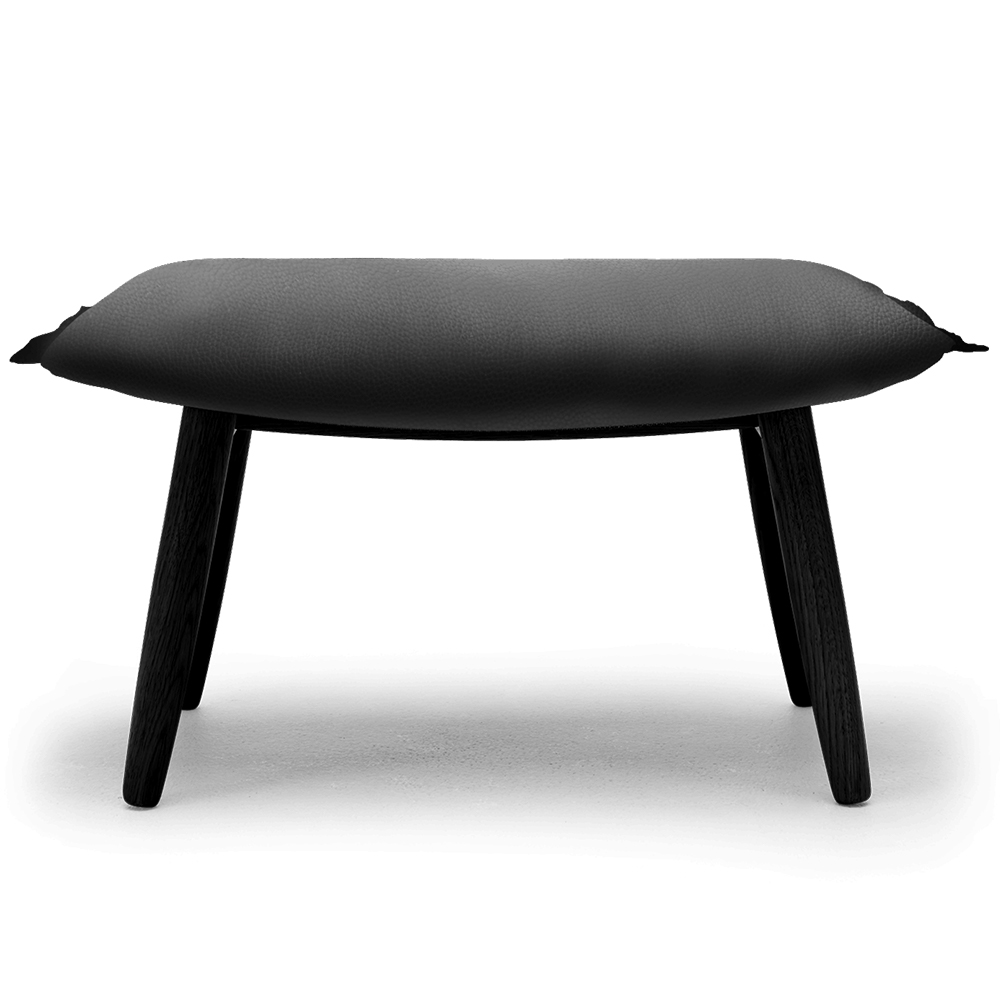 Reposapiés E016 Embrace en piel de diseño moderno de Carl Hansen and Son.