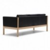 Sofá CH163 piel de Carl Hansen and Son con un diseño único que entrega calidez y modernidad.