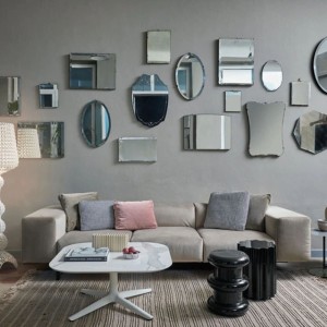 Sofá Largo de dos plazas revestido en tejido. Mueble de diseño ideal salón.