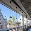 Lámpara Toldbod Suspendida de Louis Poulsen con diseño moderno y elegante.