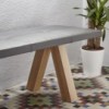 Banqueta Trestle de Viccarbe. Mobilario para espacios públicos interiores.