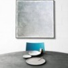 Silla elegante Sand con brazos tapizada para comedor o salones de Desalto.