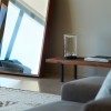 Lámpara moderna y delicada de centro de mesa Eva o EVE de Foster+Partners y Lumina.