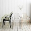Sillón de policarbonato con brazos Louis Ghost Kartell. Diseño de calidad.