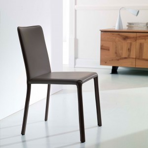 Silla Lunette de Ozzio design. Estructura metálica y tapizado en piel, ecopiel o terciopelo.